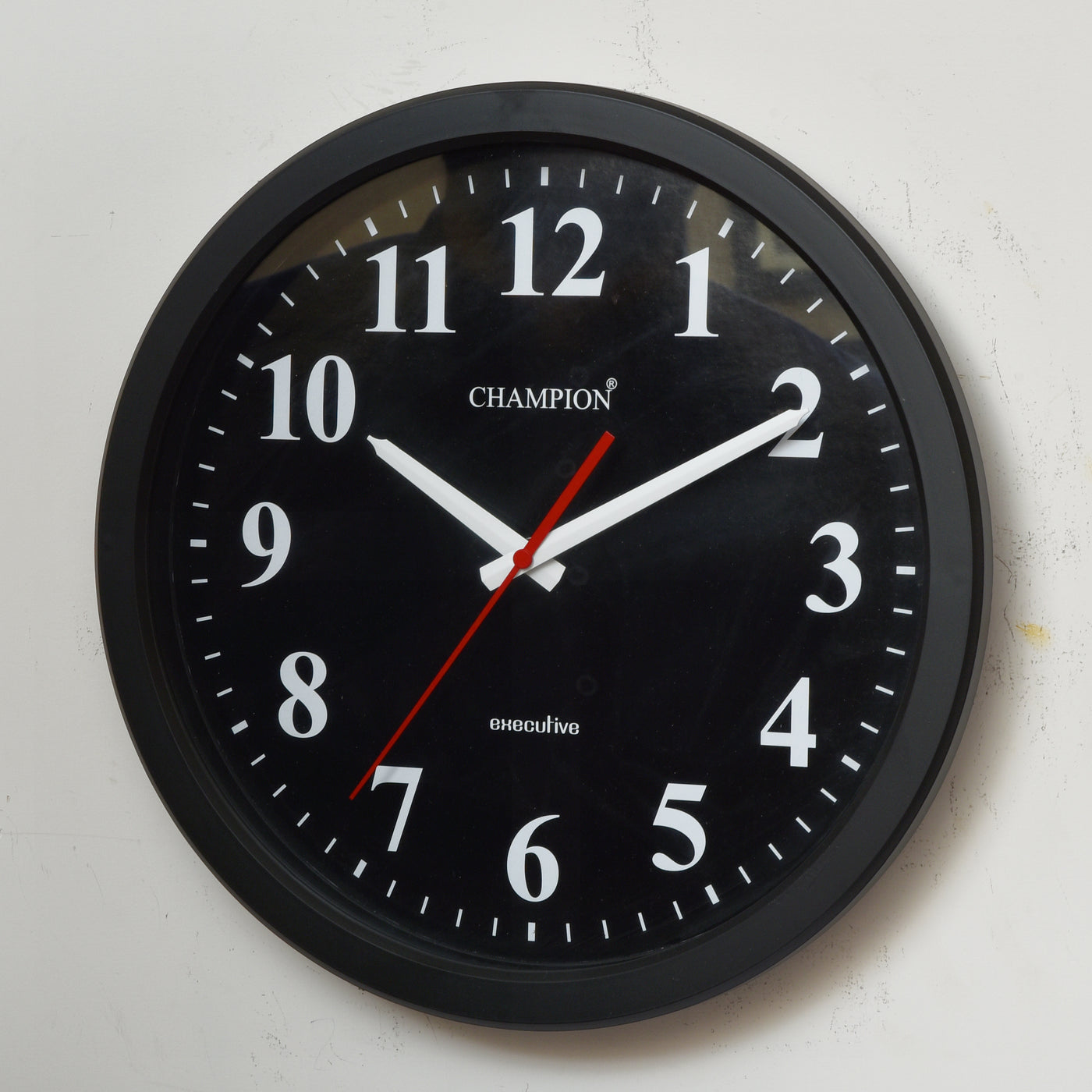 Champion Black Oval Supreme Wall Clock